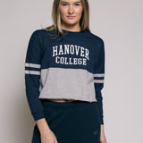 Woman wearing a navy and gray 'Hanover College' outfit on a plain background
