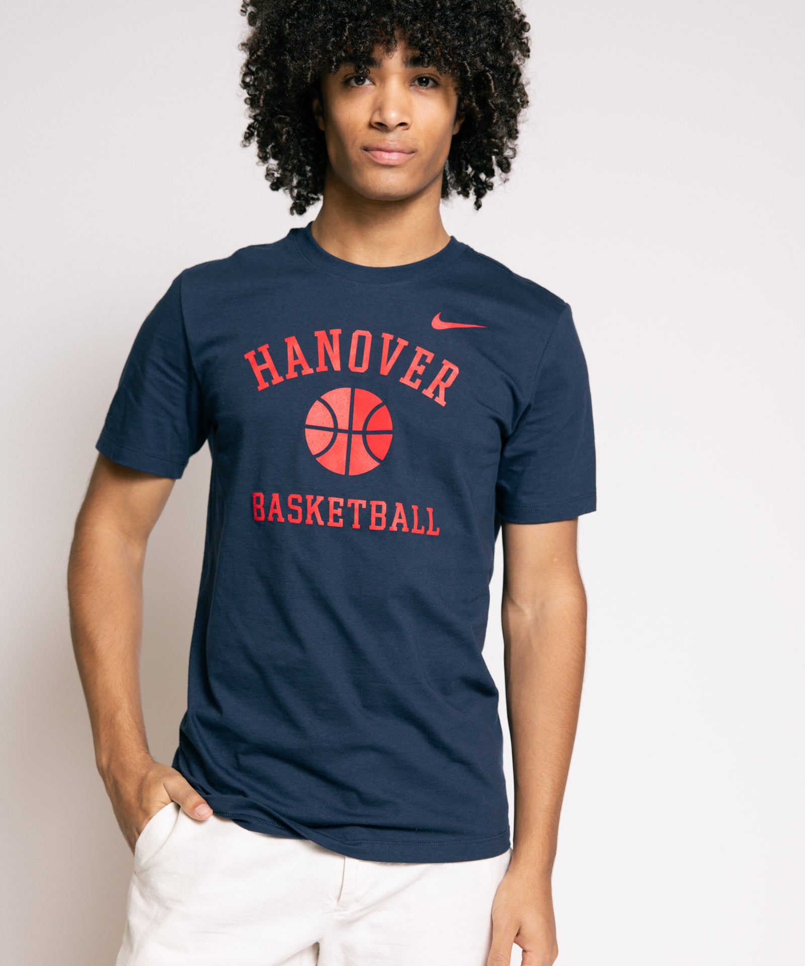 Person wearing a navy blue t-shirt with 'Hanover Basketball' text and Nike logo.