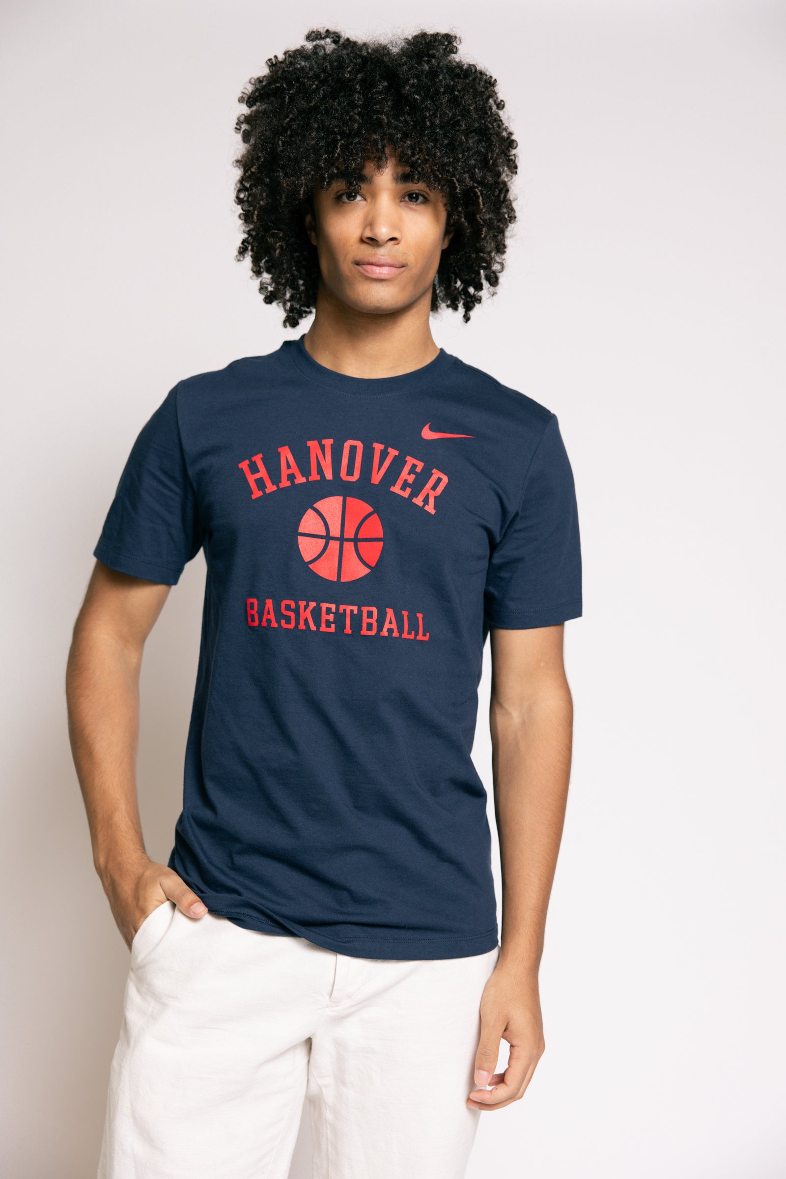 Person wearing a navy blue t-shirt with 'Hanover Basketball' text and Nike logo.